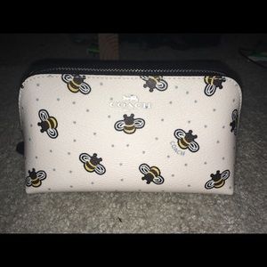 Coach cosmetic case/bee print